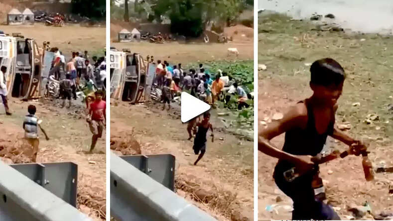 शराब की बोतलों से भरा ट्रक पलटा, शराब लूटने के लिए उमड़ी भीड़, देखिये वीडियो