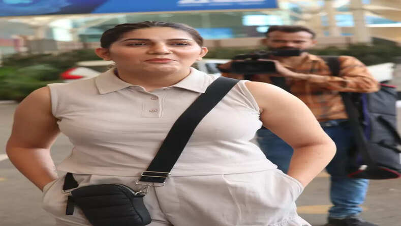 Sapna Chaudhary snapped in gorgeous beige pink co-ord set, keeps it casual to pose for paps 